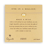 one in a million sand dollar necklace on taupe, gold dipped