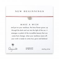 new beginnings lotus flower necklace on coral, sterling silver