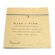 make a wish necklace with gold dipped sea horse on ocean