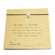 make a wish necklace with gold dipped skull on black