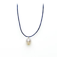white pearl on navy waxed cotton, gold dipped toggle closure