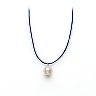 white pearl on navy waxed cotton, sterling silver toggle closure