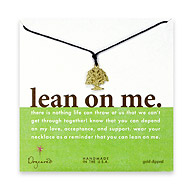 gold dipped lean on me necklace on chocolate waxed cotton