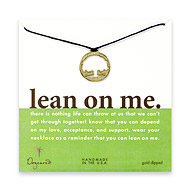 gold dipped lean on me tree silhouette necklace on chocolate waxed cotton