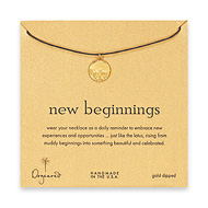 gold dipped new beginnings necklace on chocolate waxed cotton