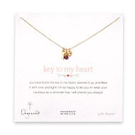 gold dipped key to my heart necklace with heart key, stone heart and garnet bead
