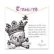 gold dipped treasured necklace with charcoal skull, rose gold dipped disco bead