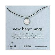 sterling silver new beginnings necklace on chocolate waxed cotton