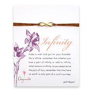 large gold dipped infinity bracelet on tobacco irish linen